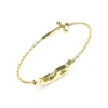 Guess Bijoux Bracelet<Bracelet South Alameda Acier Doré Motif Dague